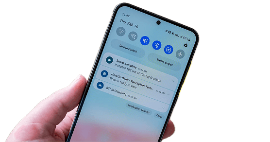 Phone in hand showing notifications